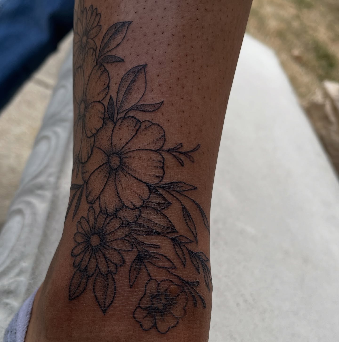 Floral arrangement black and grey tattoo on the forearm by Tina Petrullo, West Chester Township, Butler County, Ohio