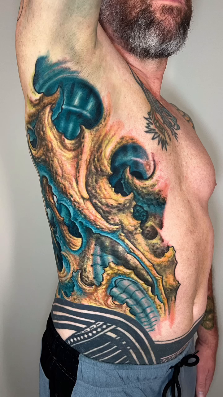 Biomechanical creature dark realism tattoo by Ty McEwen Tattoo Artist │ Bioorganic │