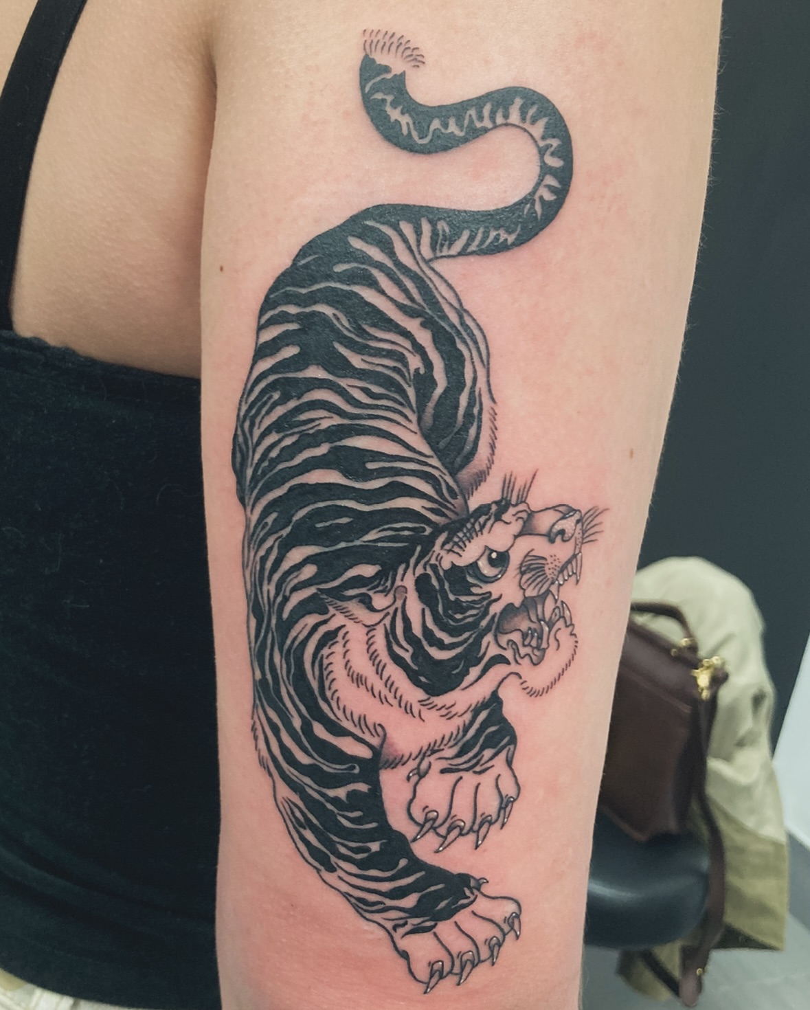Tiger black and grey tattoo on the forearm by Ash Nicole Painterly, San Diego, California