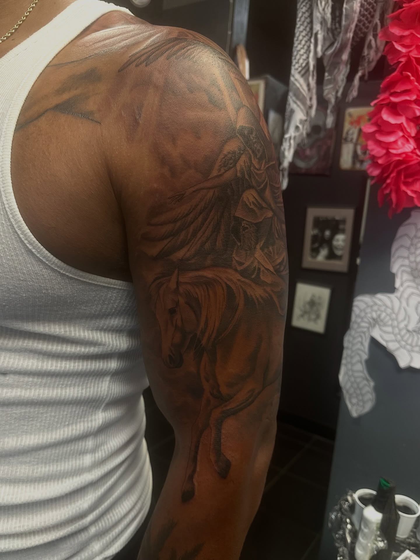 Horses realism tattoo on the upper arm by Carly🪲 greensboro tattoo artist, Greensboro, North Carolina
