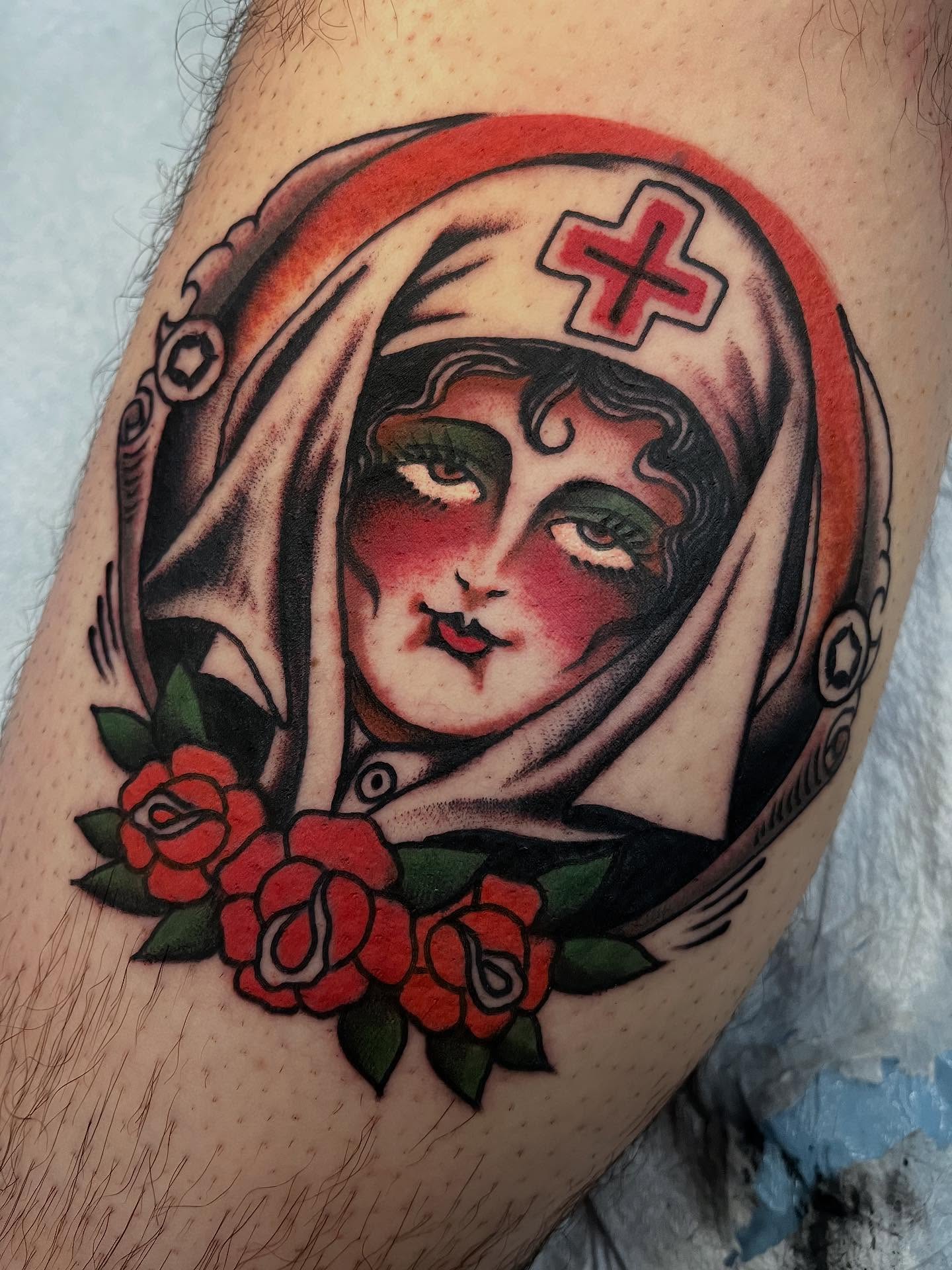 Nurse portrait American traditional tattoo on the thigh by JohnJohn