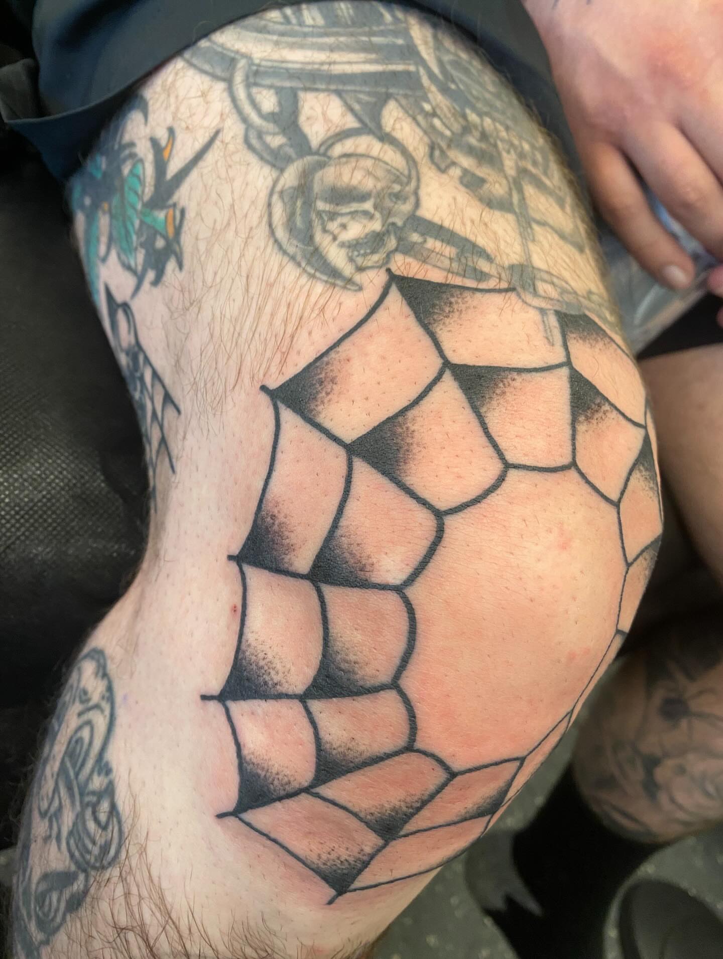 Geometric pattern geometric tattoo on the thigh by Payton Prentice