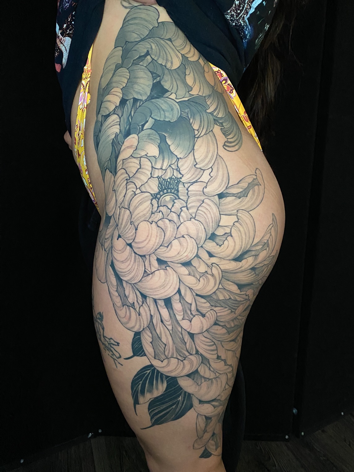Chrysanthemum japanese irezumi tattoo on the thigh by Gerardo Brawder