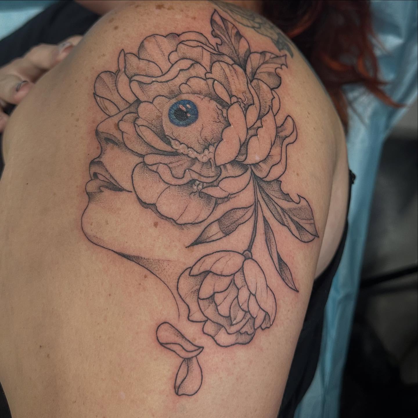 Peony flower dotwork tattoo on the shoulder by Halle Haas