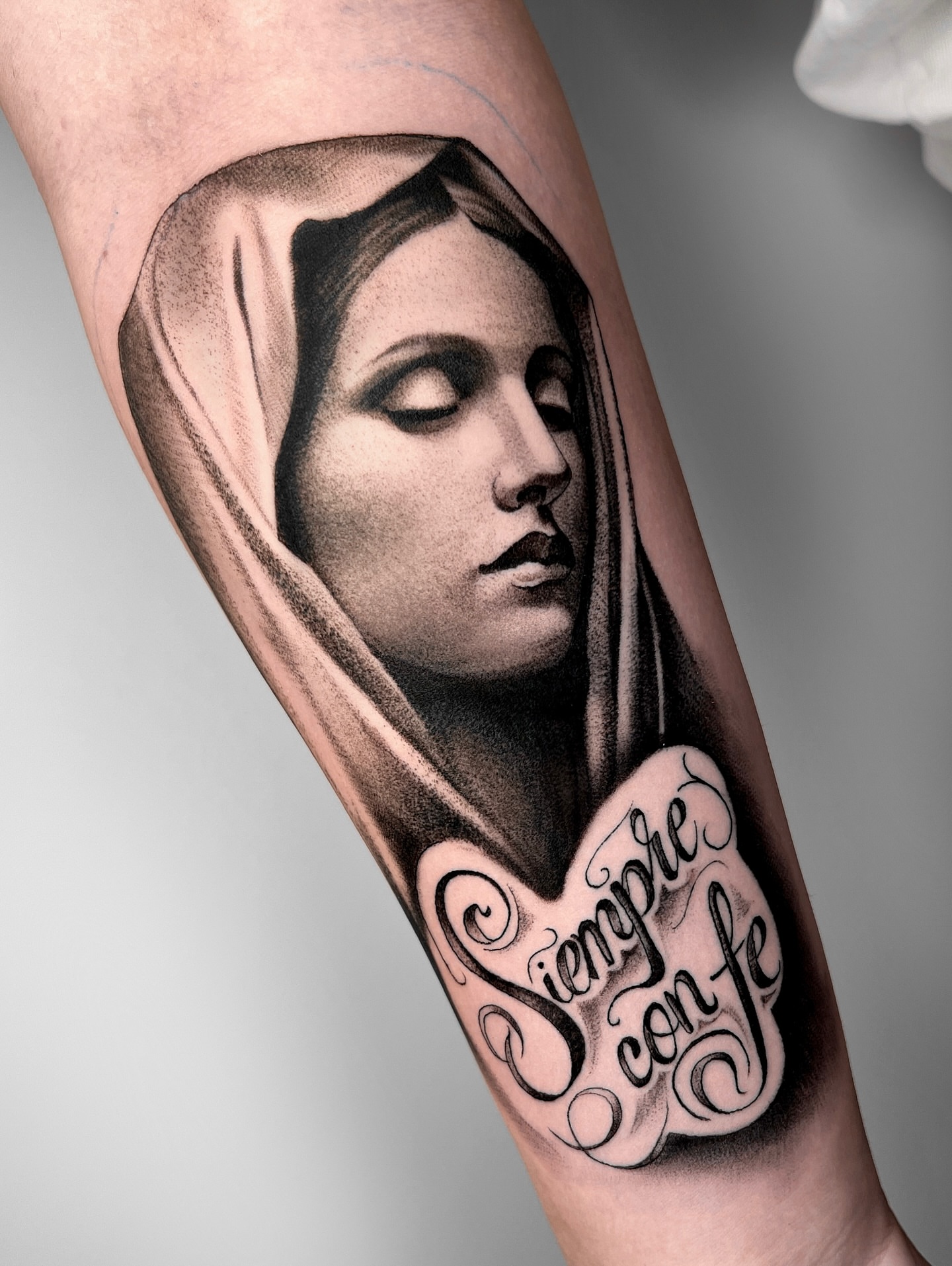 Woman with veil realism tattoo on the forearm by 🤎Dannon 🕸