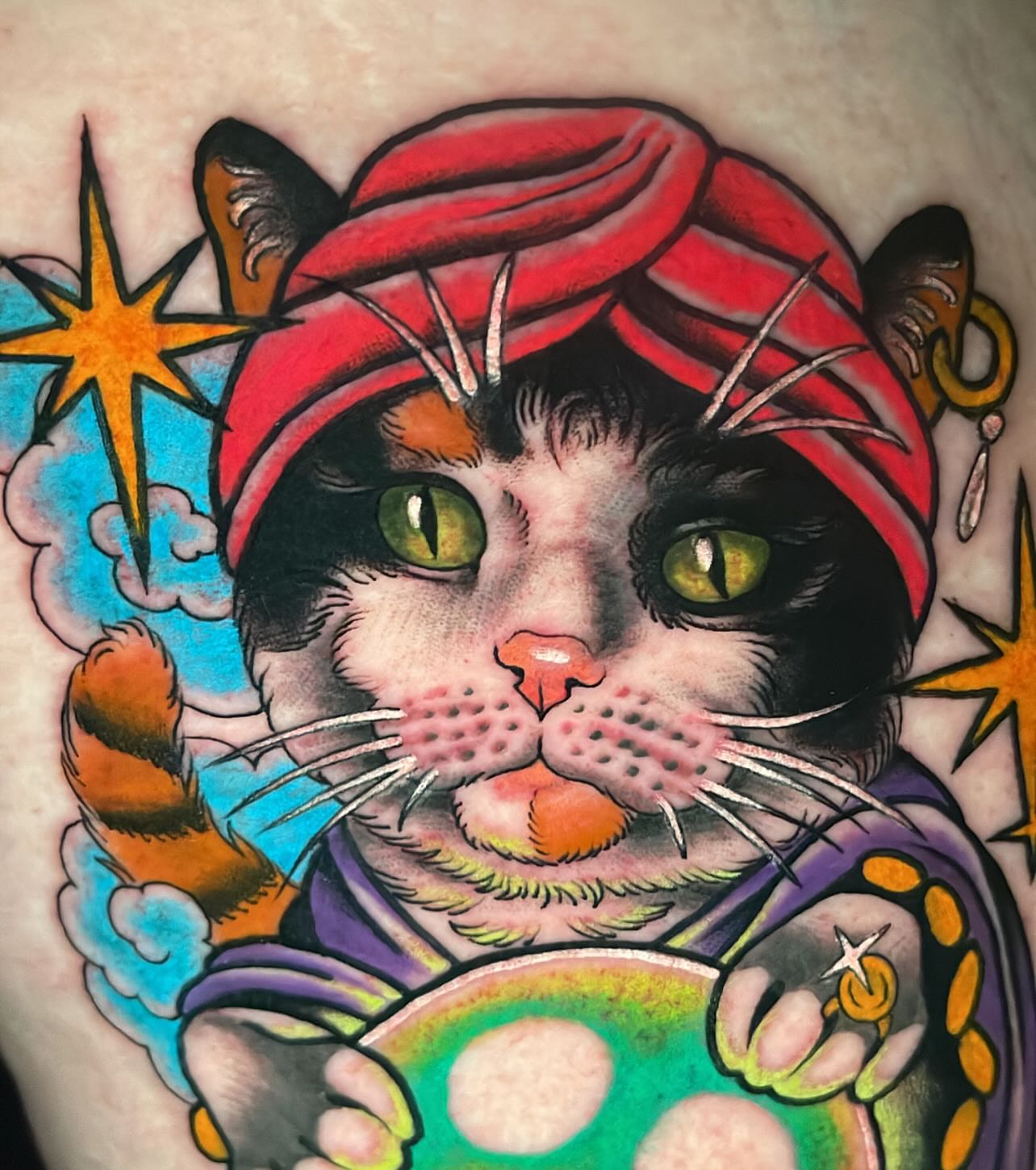 Cat American traditional tattoo on the chest by Holli Marie