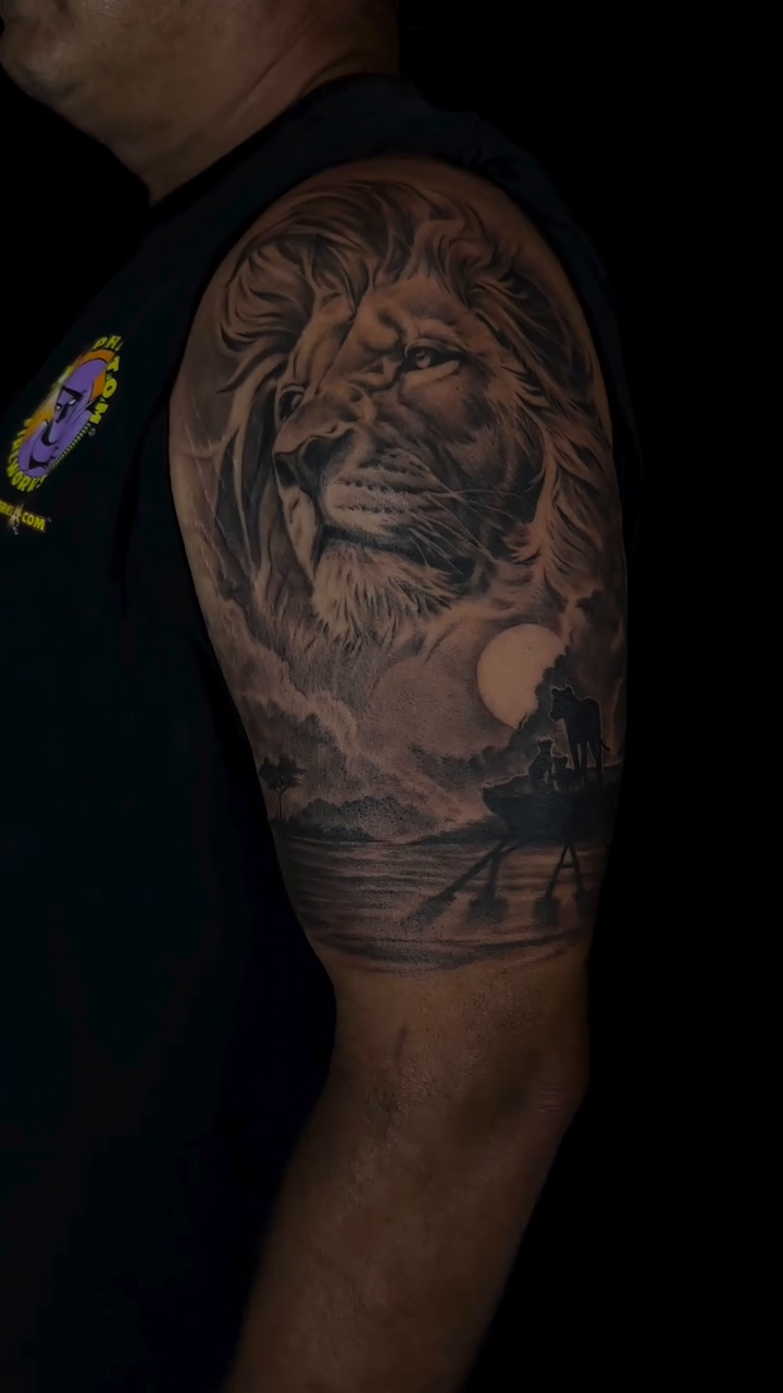 Lion and moon realism tattoo by Matthew Doherty