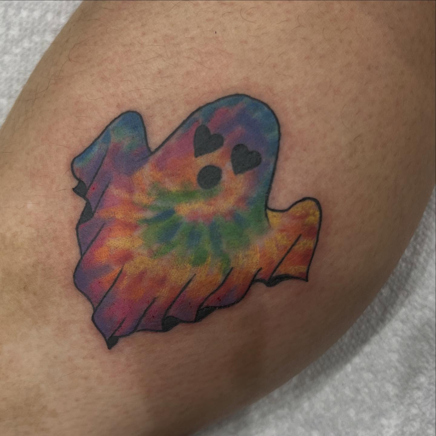 Tie-dye ghost new school tattoo on the thigh by Sav