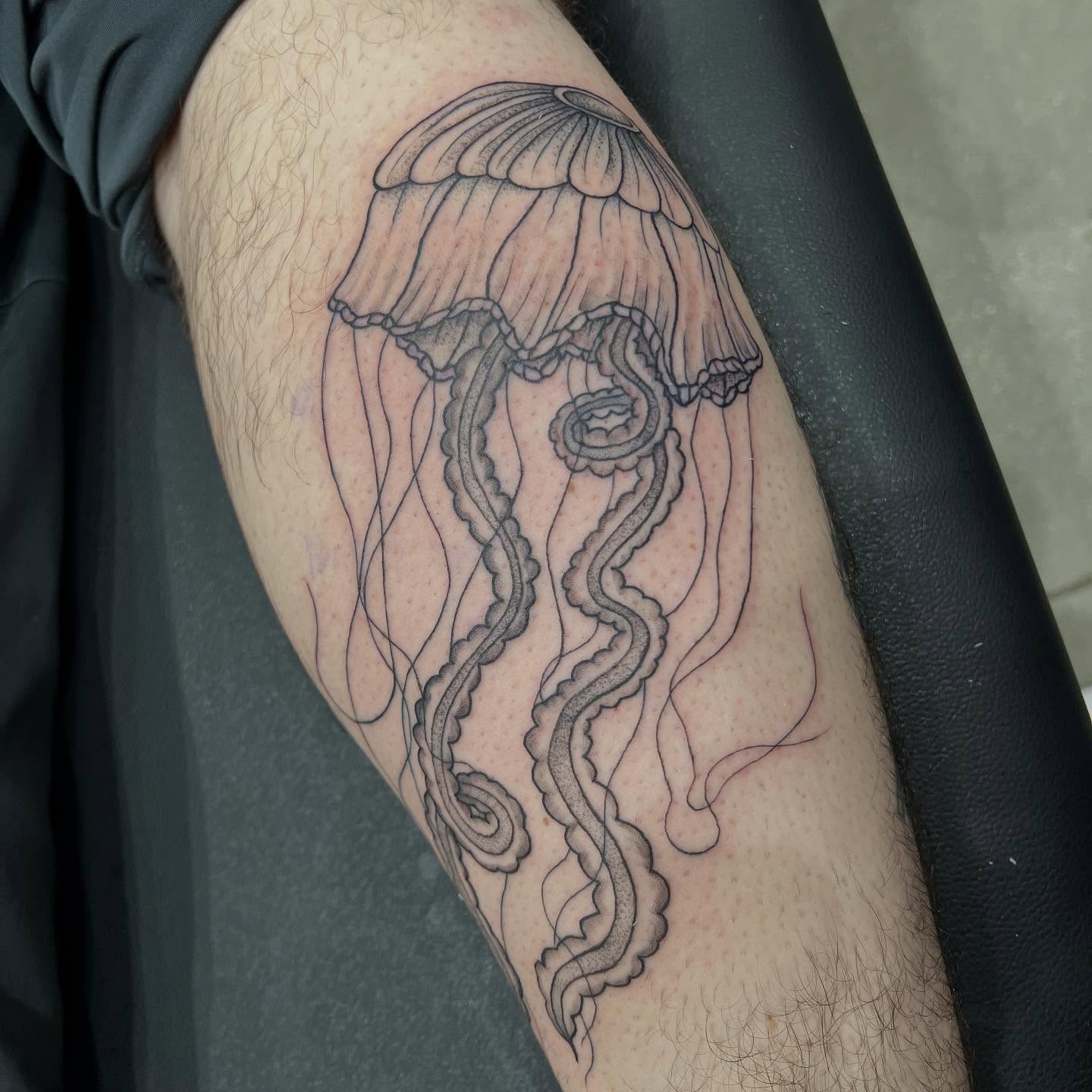 Jellyfish black and grey tattoo on the forearm by Sav