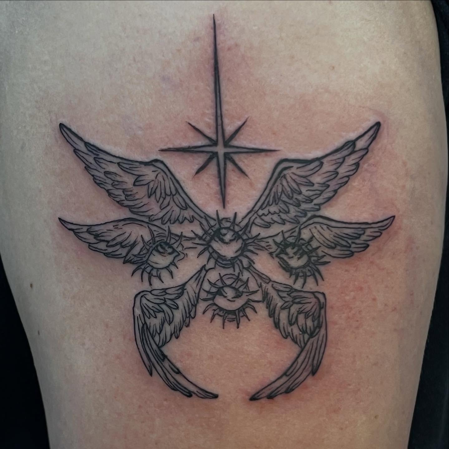 Angelic creature black and grey tattoo on the thigh by Sav