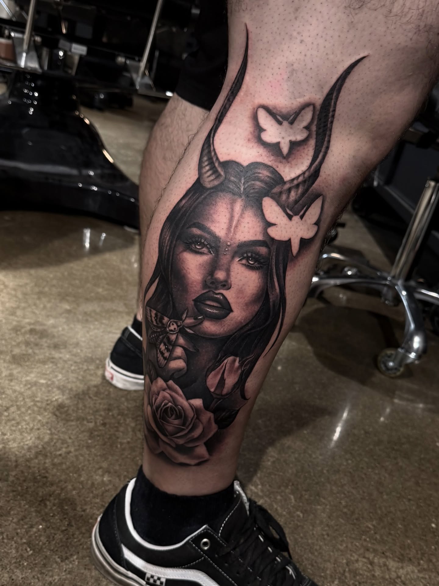 Woman with horns and butterflies realism tattoo on the forearm by Grace P