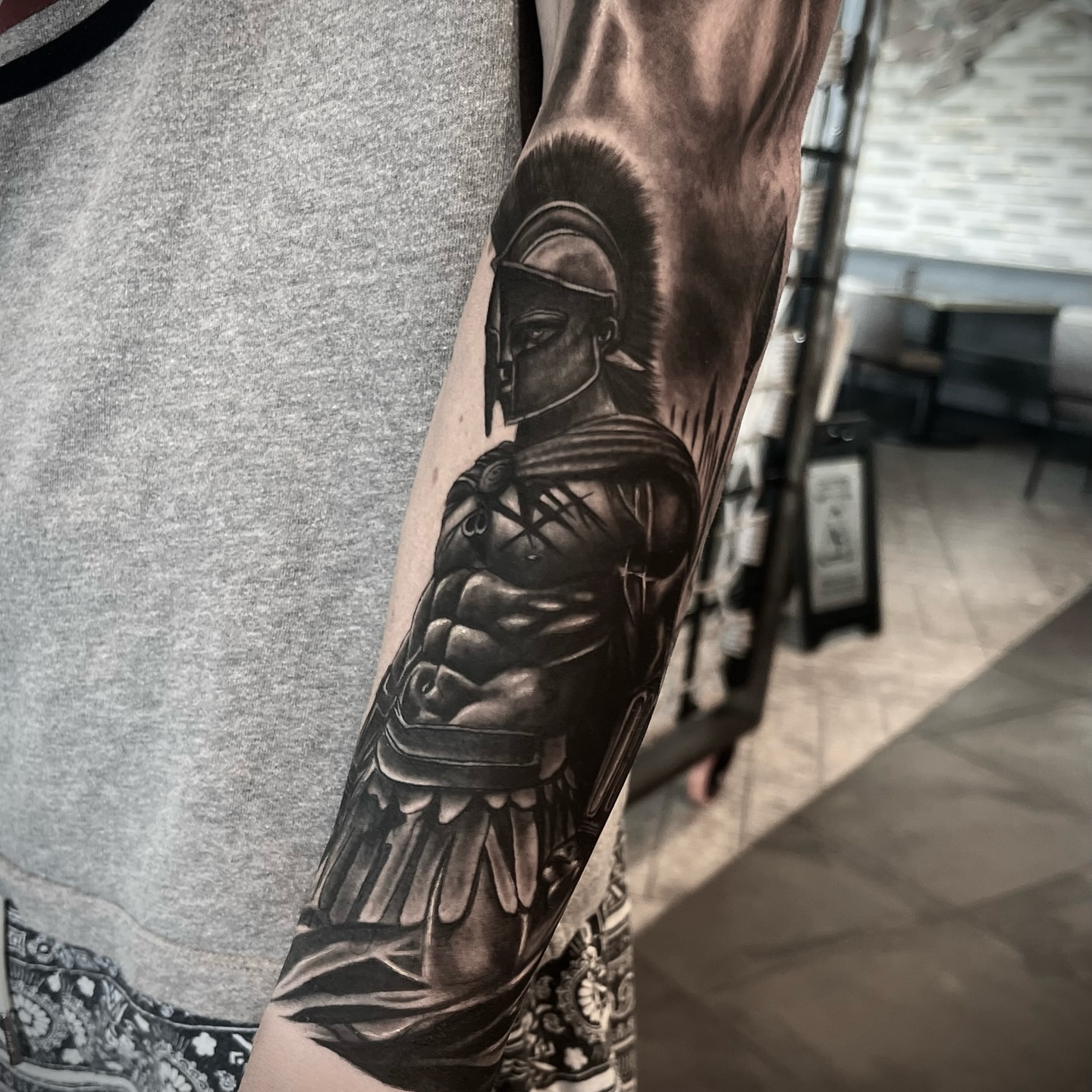 Ancient warrior realism tattoo on the forearm by 𝕭𝖑𝖆𝖐𝖊 𝕱𝖊𝖗𝖔𝖓𝖊