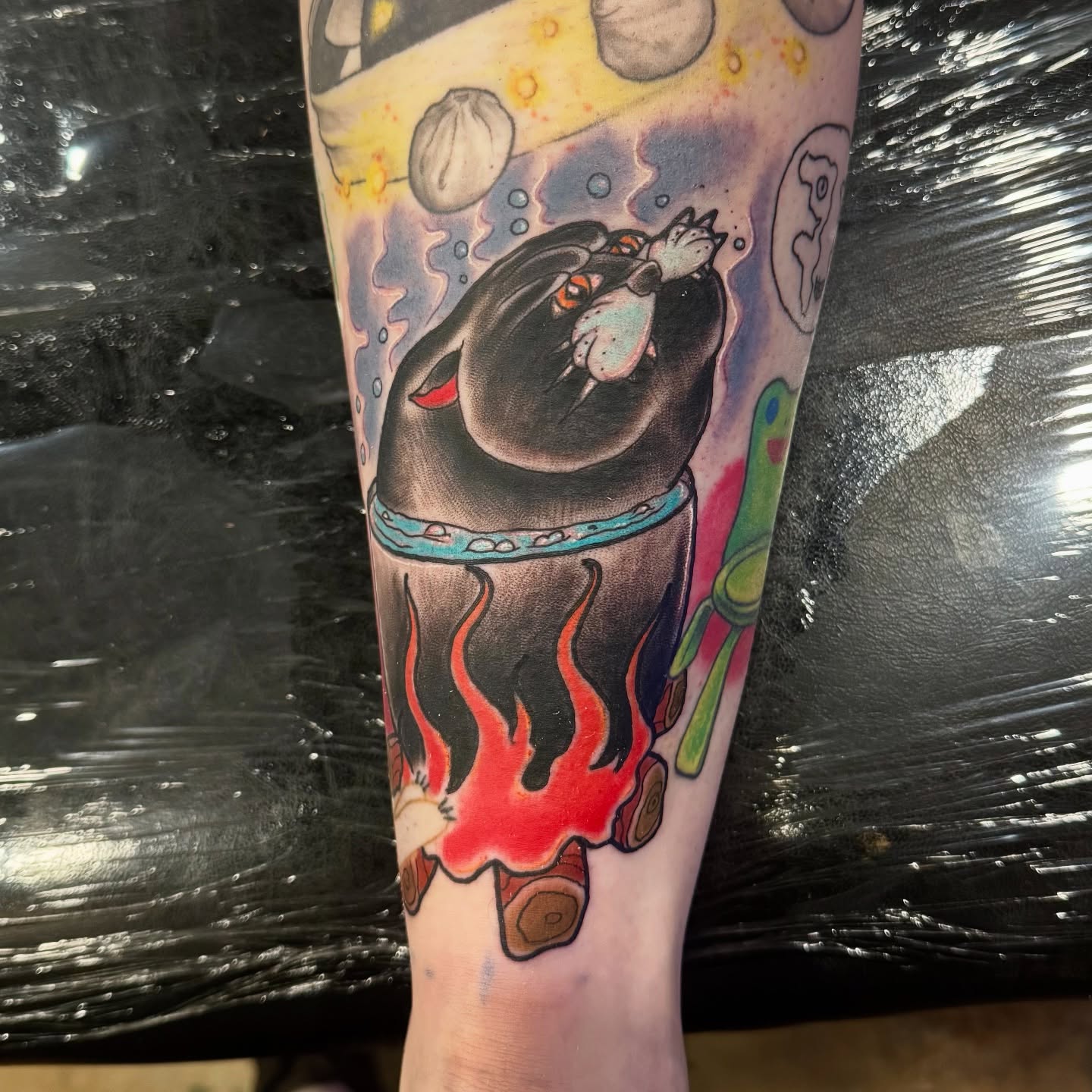 Cat cooking American traditional tattoo on the forearm by David C. McGhee