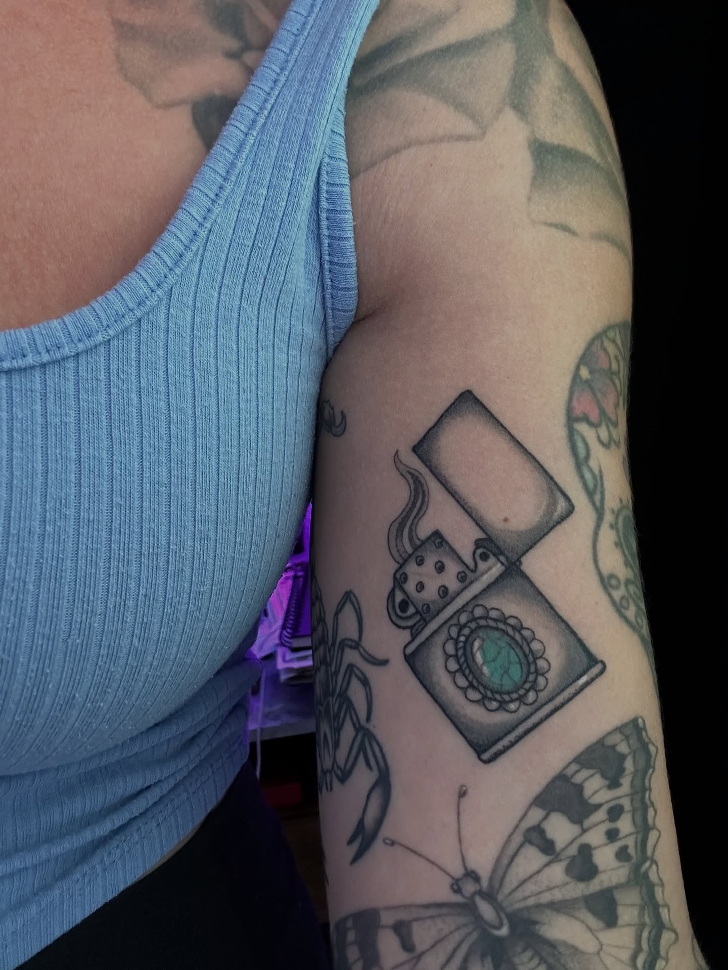Camera black and grey tattoo on the forearm by 𝓰𝓲𝓷𝓪 𝓼𝓮𝓻𝓹𝓮𝓷𝓽𝓲𝓷𝓪