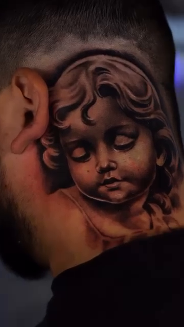Cherub portrait realism tattoo by Anthony Maya