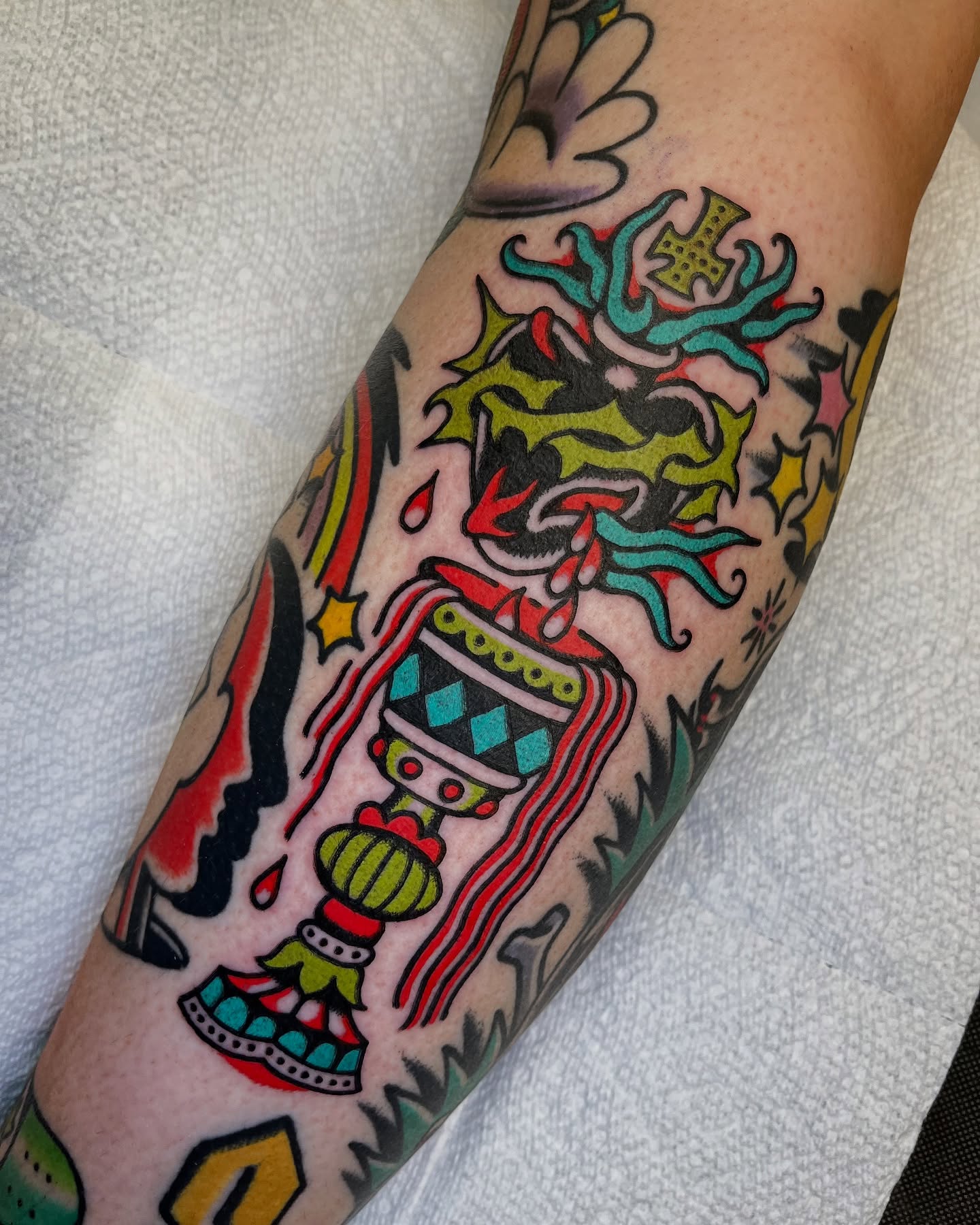 Vase with floral arrangement American traditional tattoo on the forearm by π΅ππππ π¬ππππ