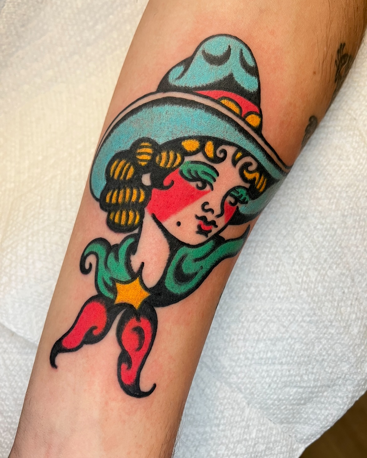 Woman with hat American traditional tattoo on the forearm by π΅ππππ π¬ππππ