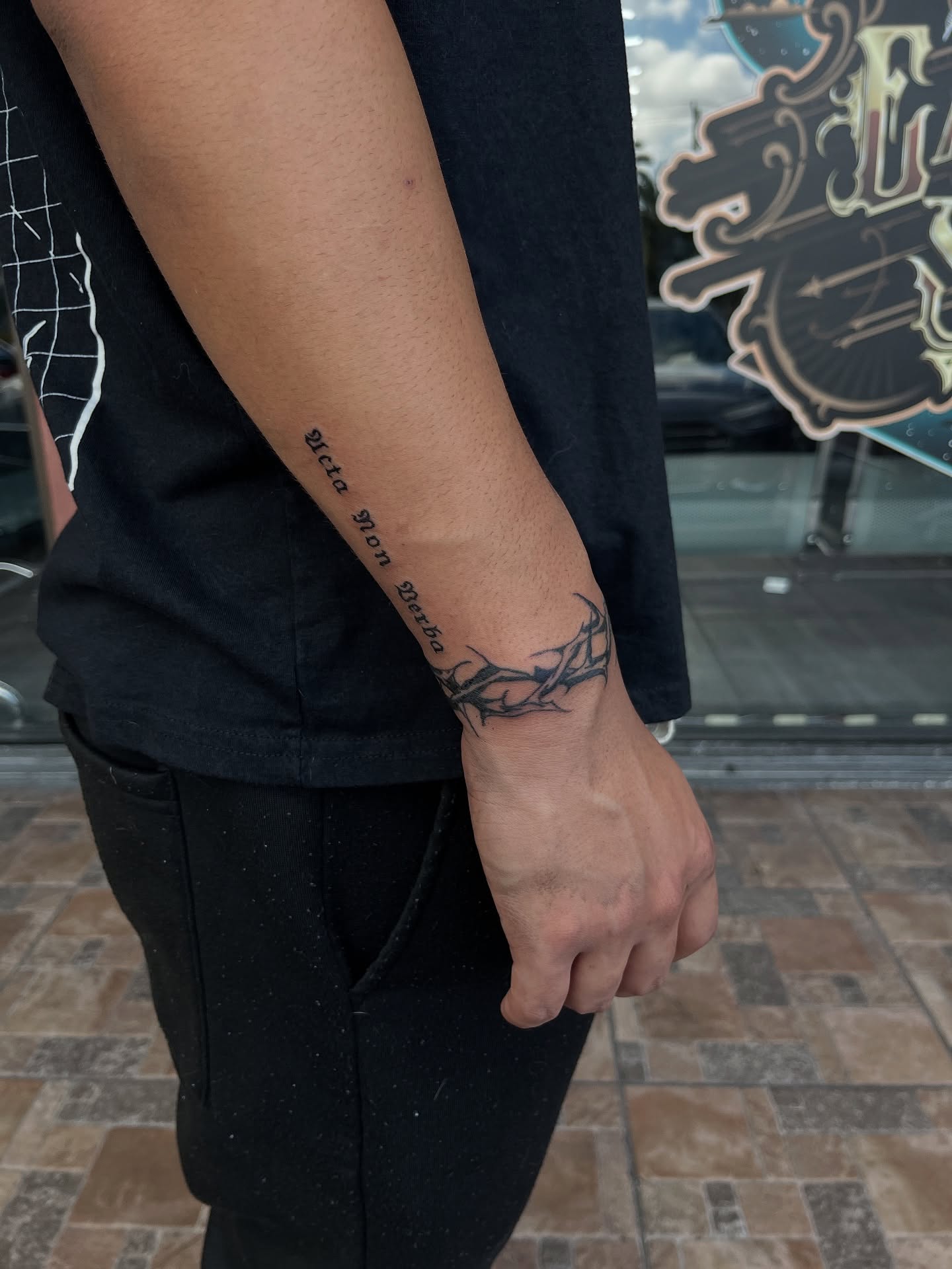 Thorn crown black and grey tattoo on the forearm by Elijah Cosme, Miami, Florida