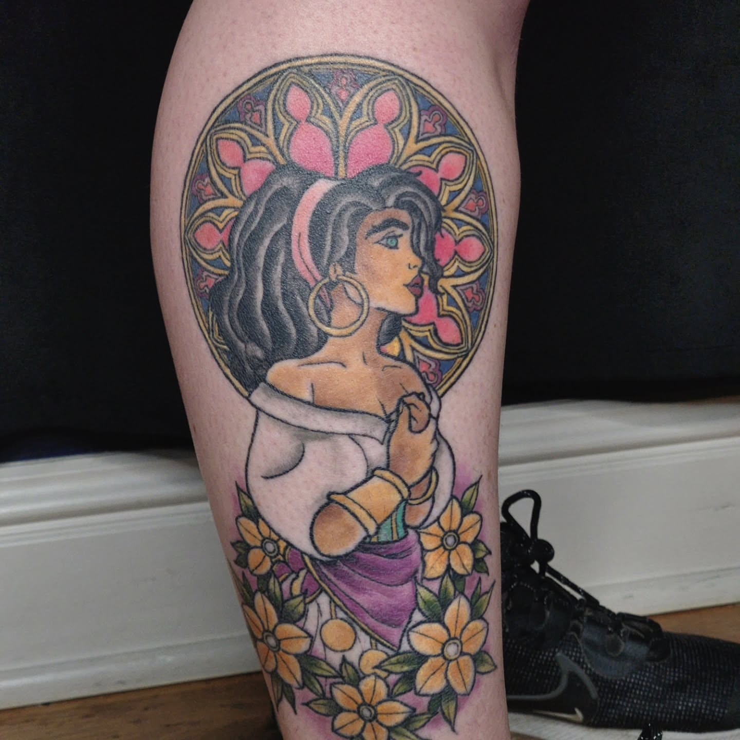 Woman with flowers new school tattoo on the thigh by Audrey Luther