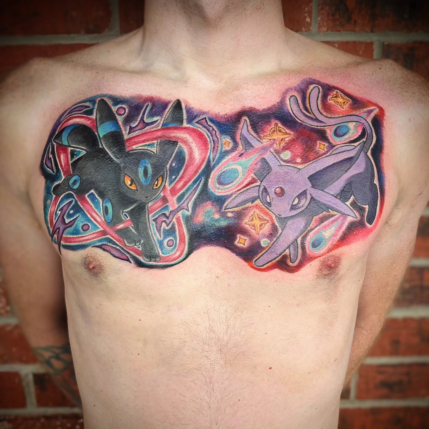 Two Pokémon dotwork tattoo on the chest by 𝕸𝖆𝖉𝖎 (𝕸𝖆𝖉 𝕯𝖔𝖌)