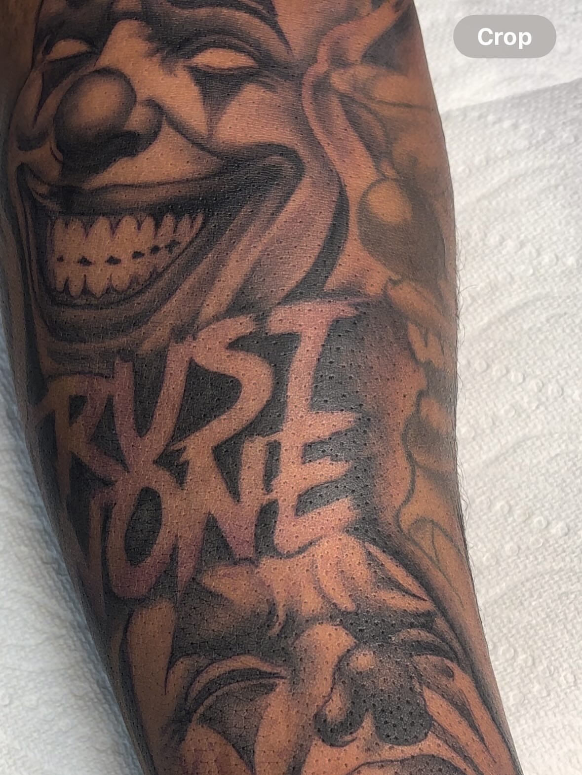 Clown face black and grey tattoo on the forearm by FleeDott 🇨🇴