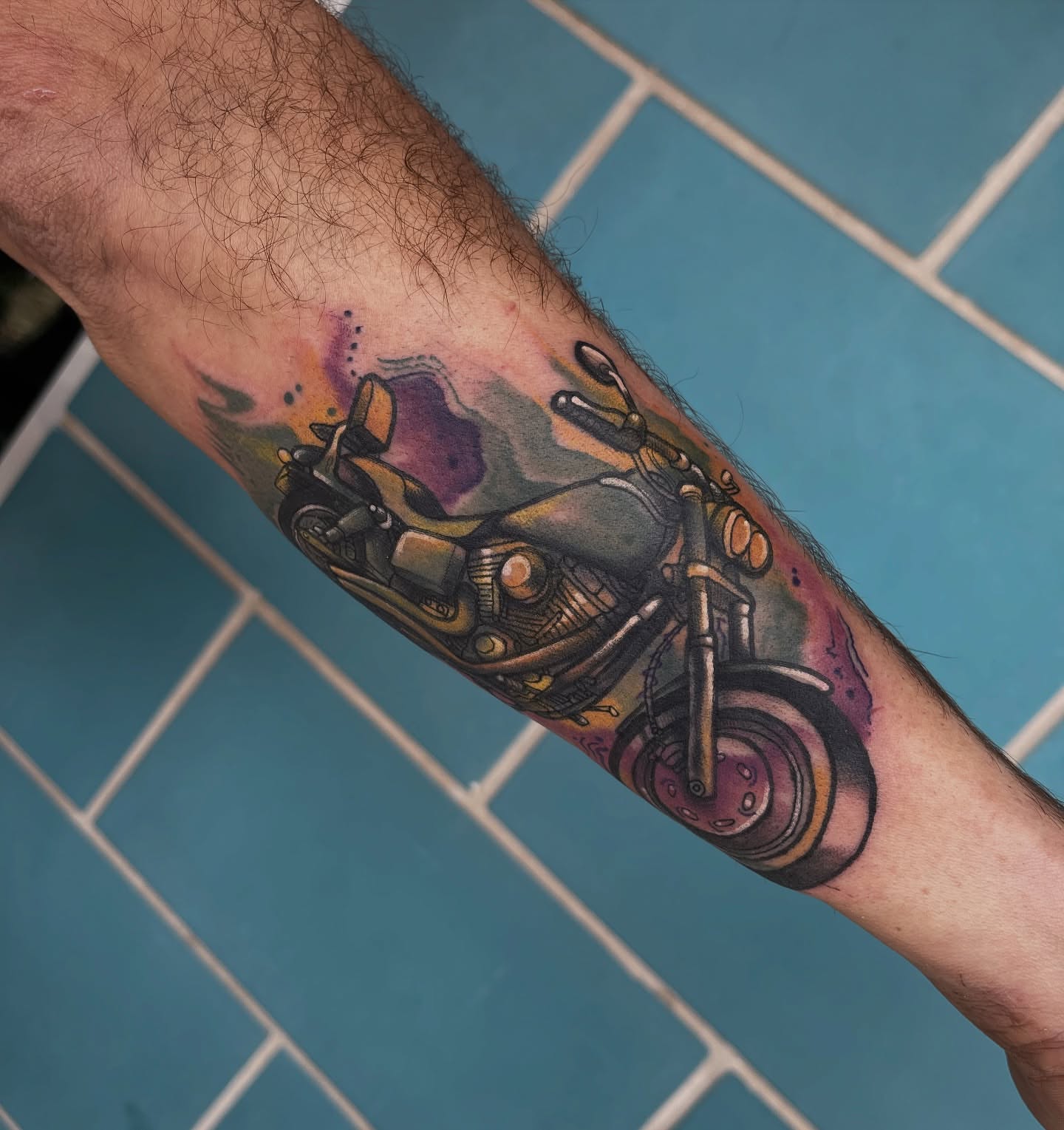 Motorcycle realism tattoo on the forearm by Chris Sparks, I just go by Sparks.