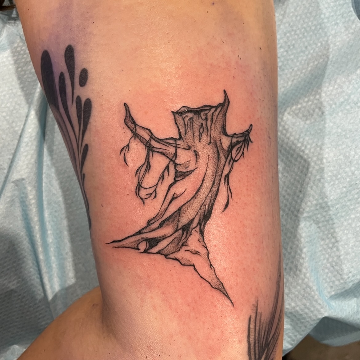 Nude figure emerging from tree trunk dotwork tattoo on the forearm by Mia 	\(★ω★)