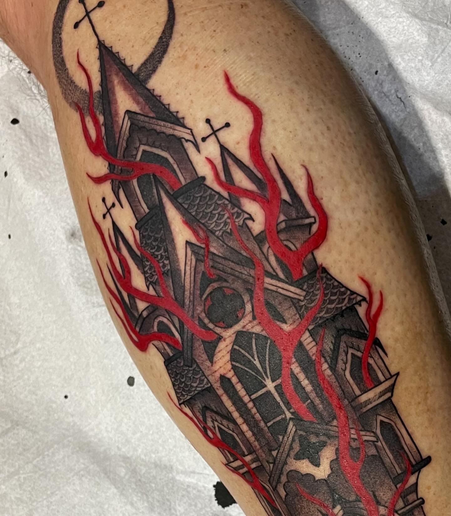 Burning church dark realism tattoo on the forearm by Kathryn the Tooth Collector