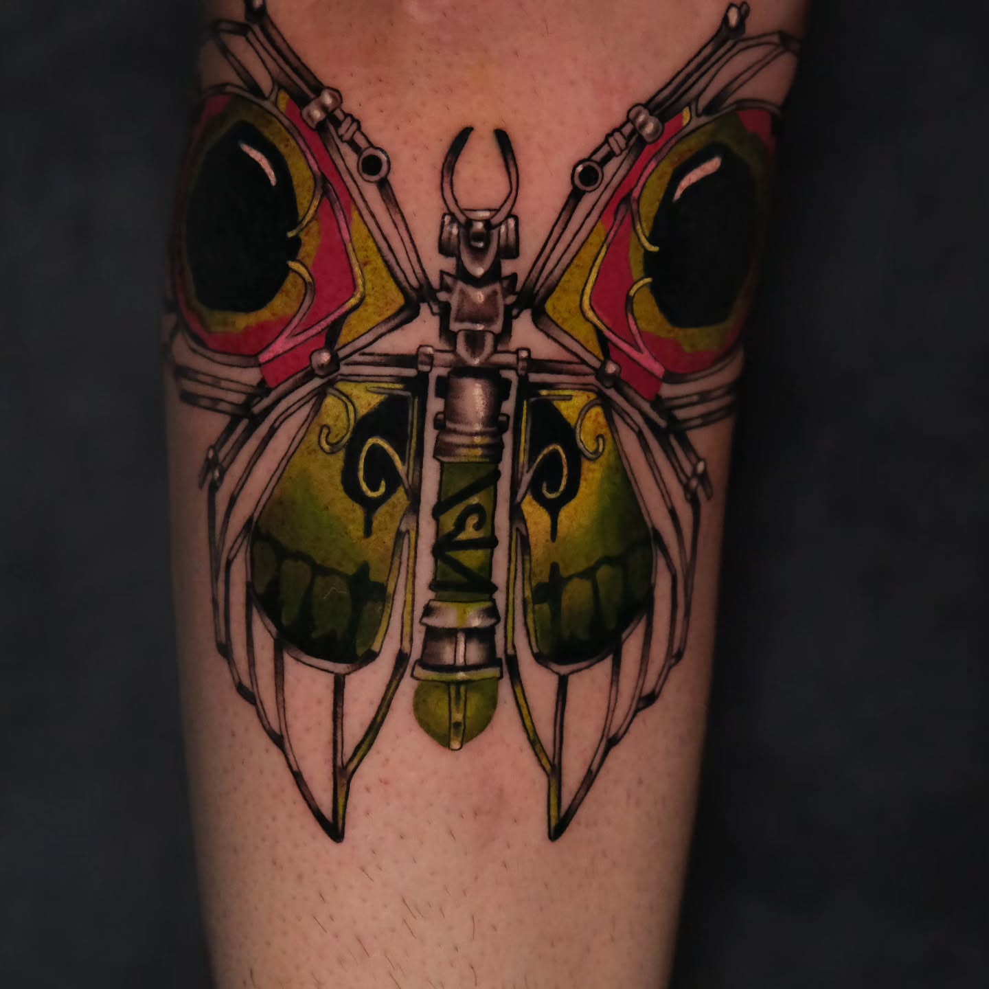 Butterfly geometric tattoo on the forearm by Tash  - Seattle Tattoo Artist