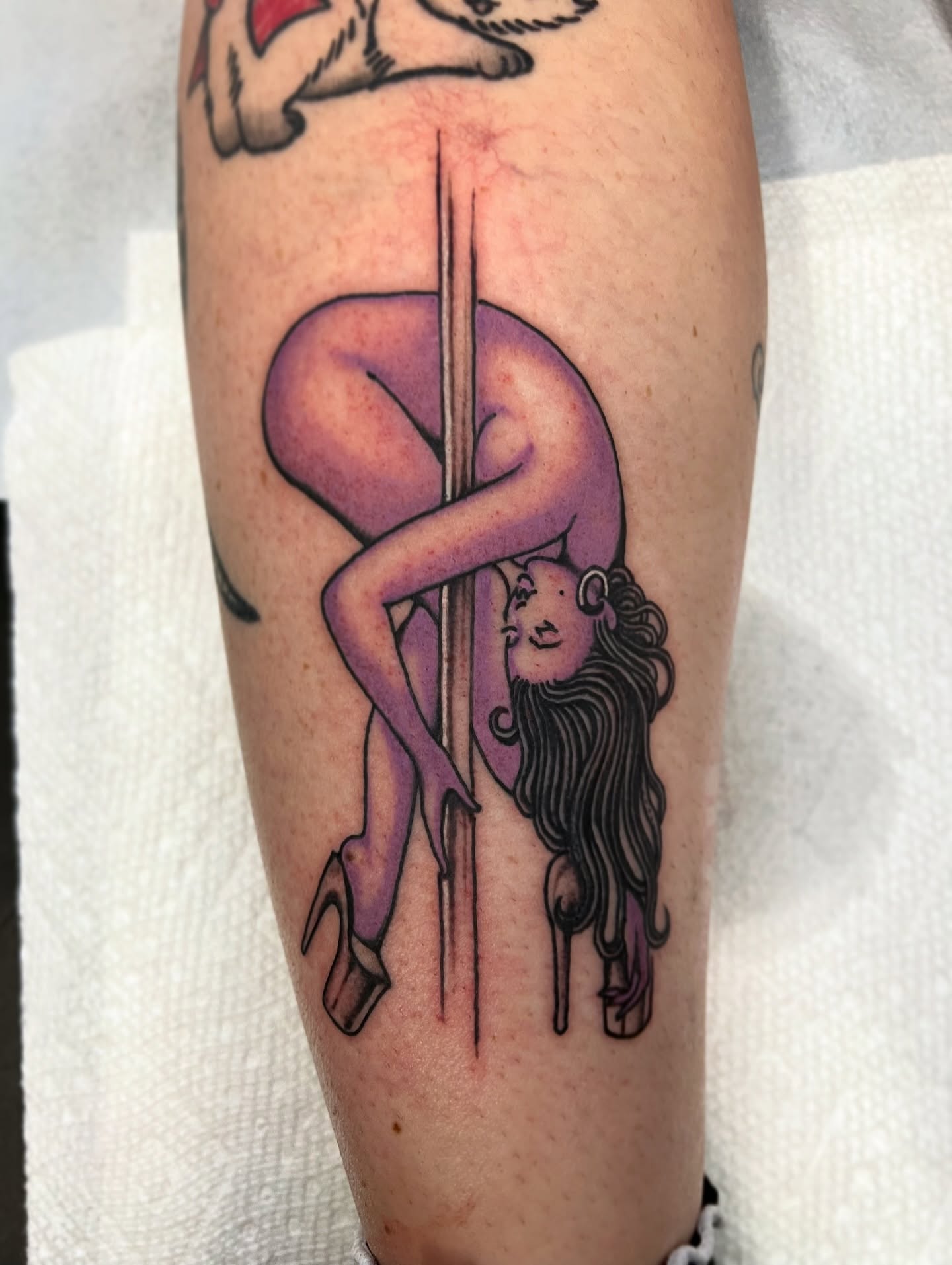 Pole dancer illustrative tattoo on the forearm by superteal