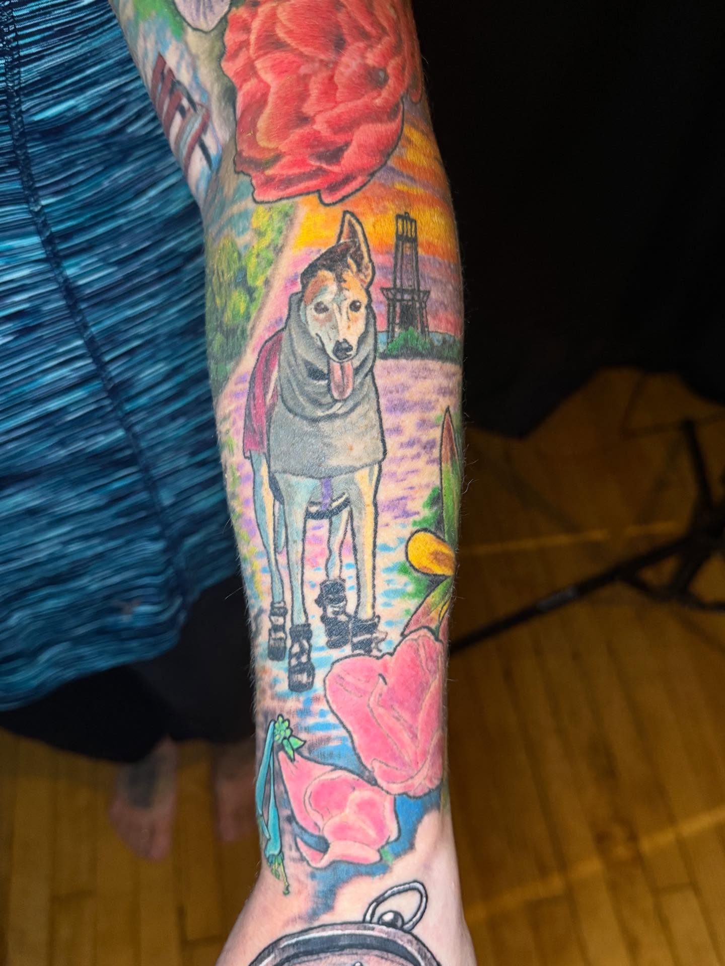 Dog on roller skates new school tattoo on the forearm by Patrick Cornolo