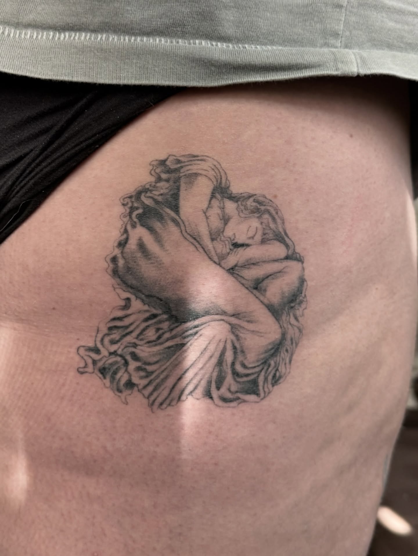 Sleeping woman black and grey tattoo on the thigh by Jojo Rose ✨ Denver Tattoo Artist