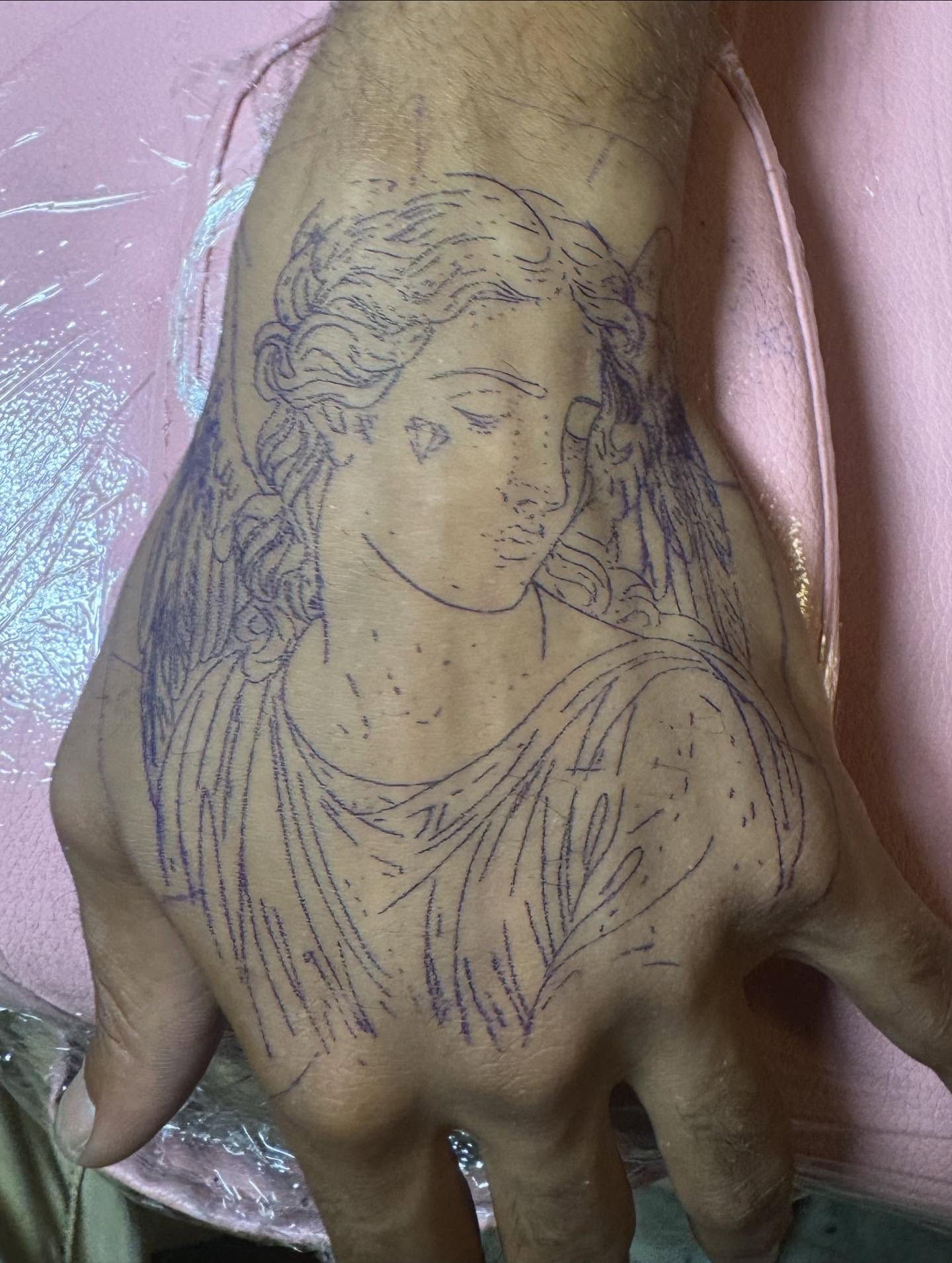 Woman with braids sketch tattoo on the hand by Gabe