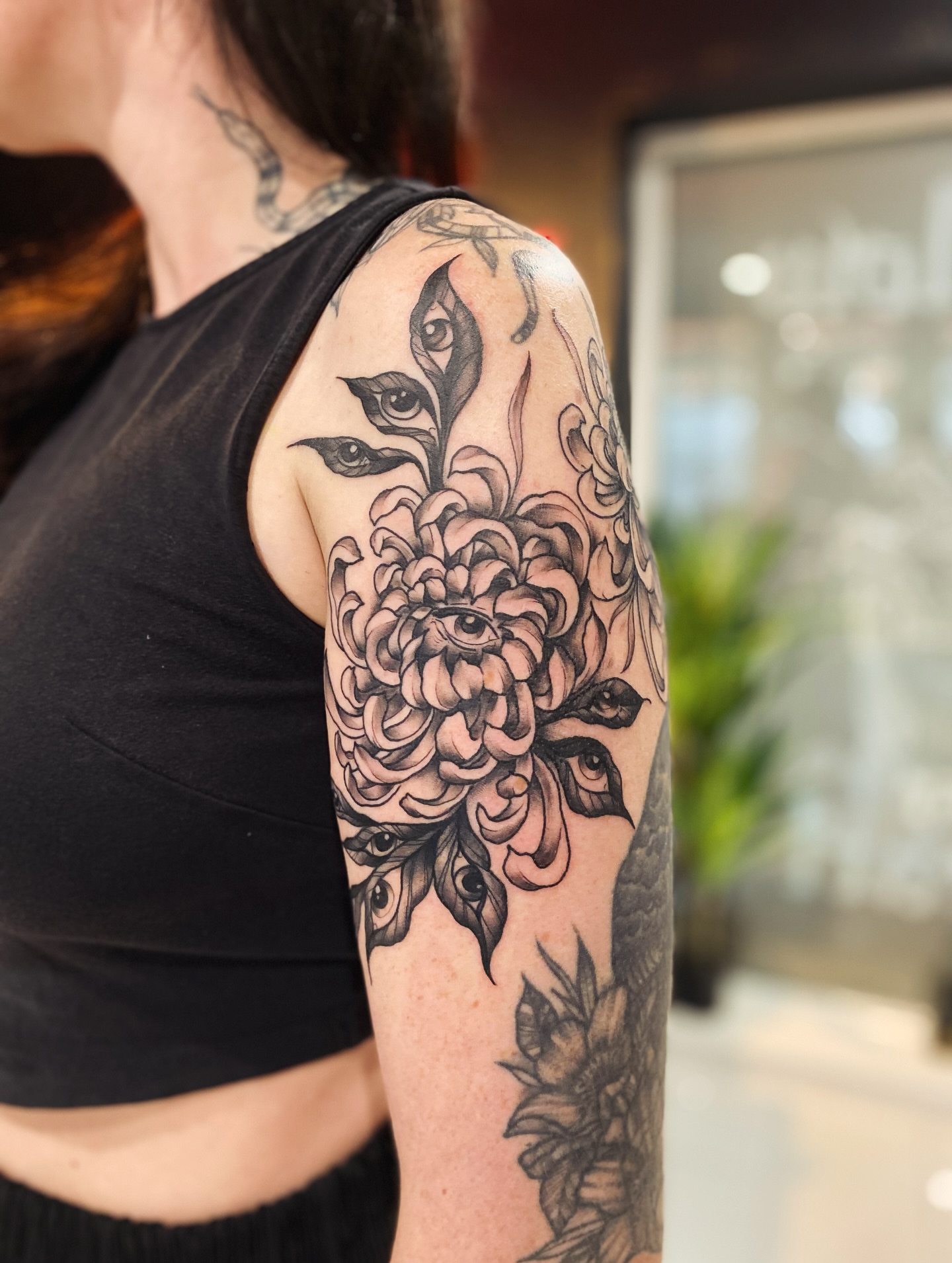 Tattoo by @chrisdafacetattoo — black_and_grey
