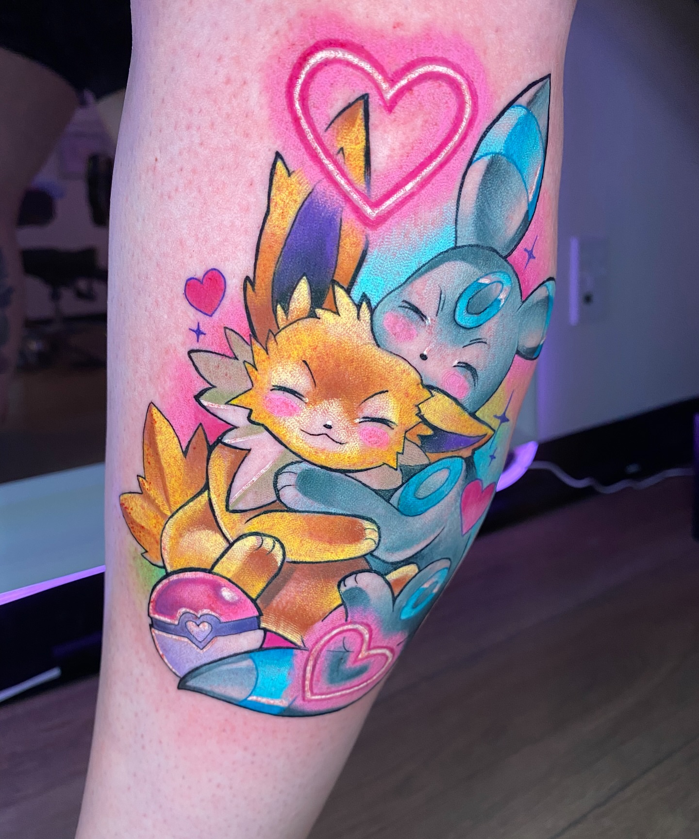 Two cute Pokémon characters new school tattoo on the forearm by Amy Porter
