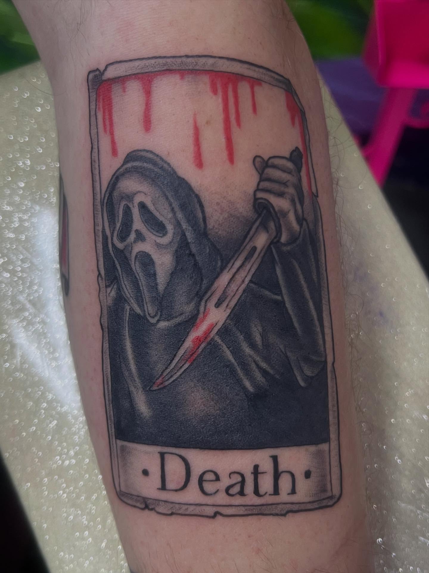 Death card realism tattoo on the forearm by Sav