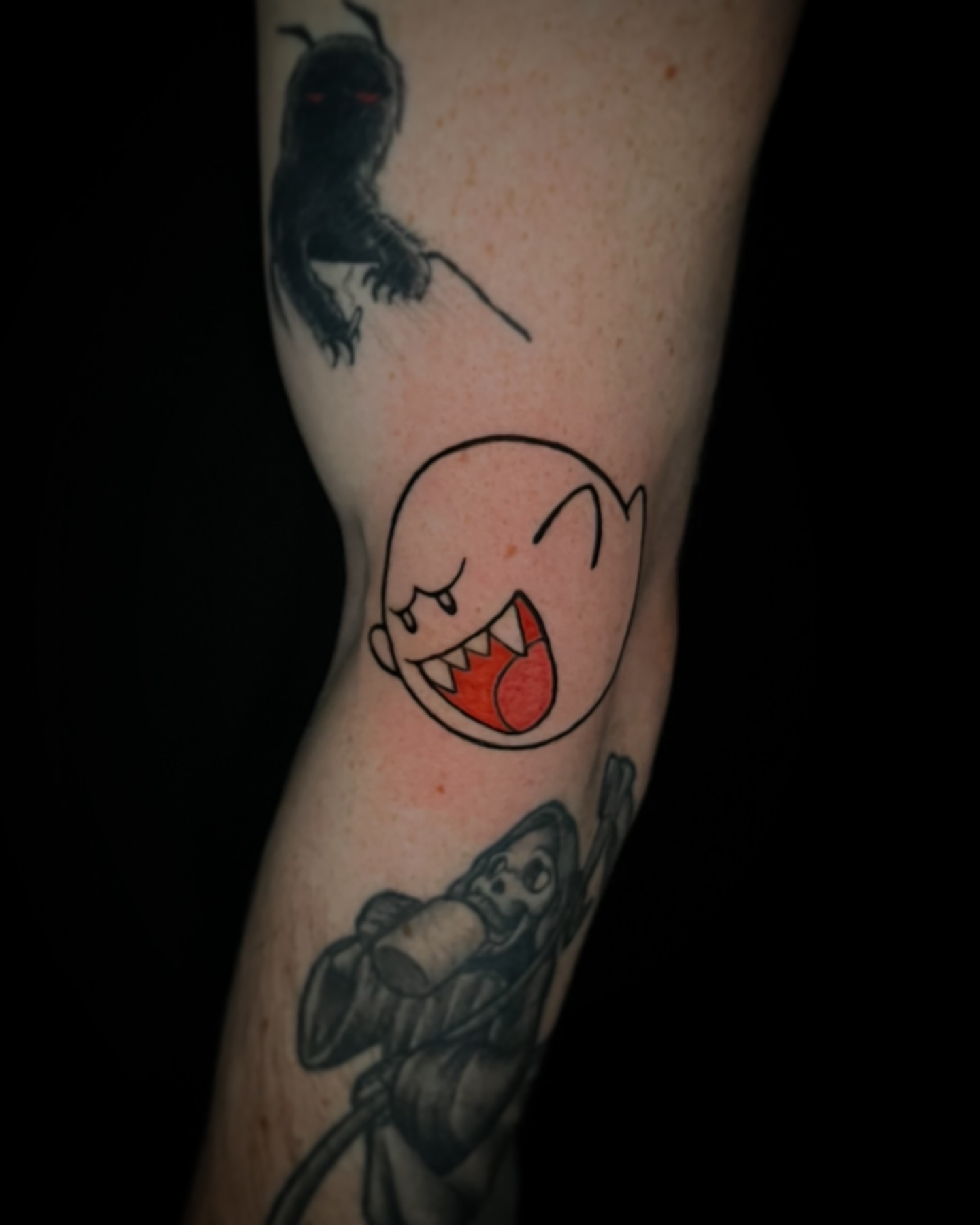 Angry ghost dotwork tattoo on the forearm by Jake, Salt Lake City, Utah