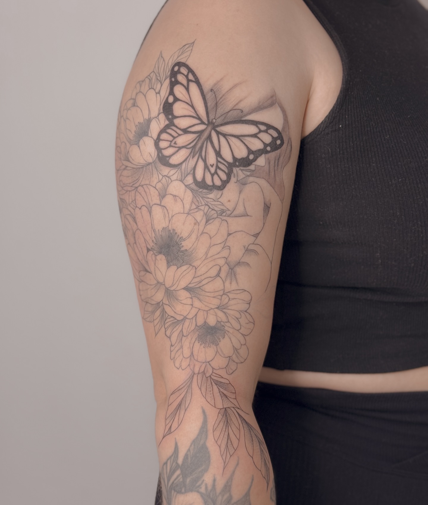 Tattoo by @romanova.skinart — black_and_grey, realism