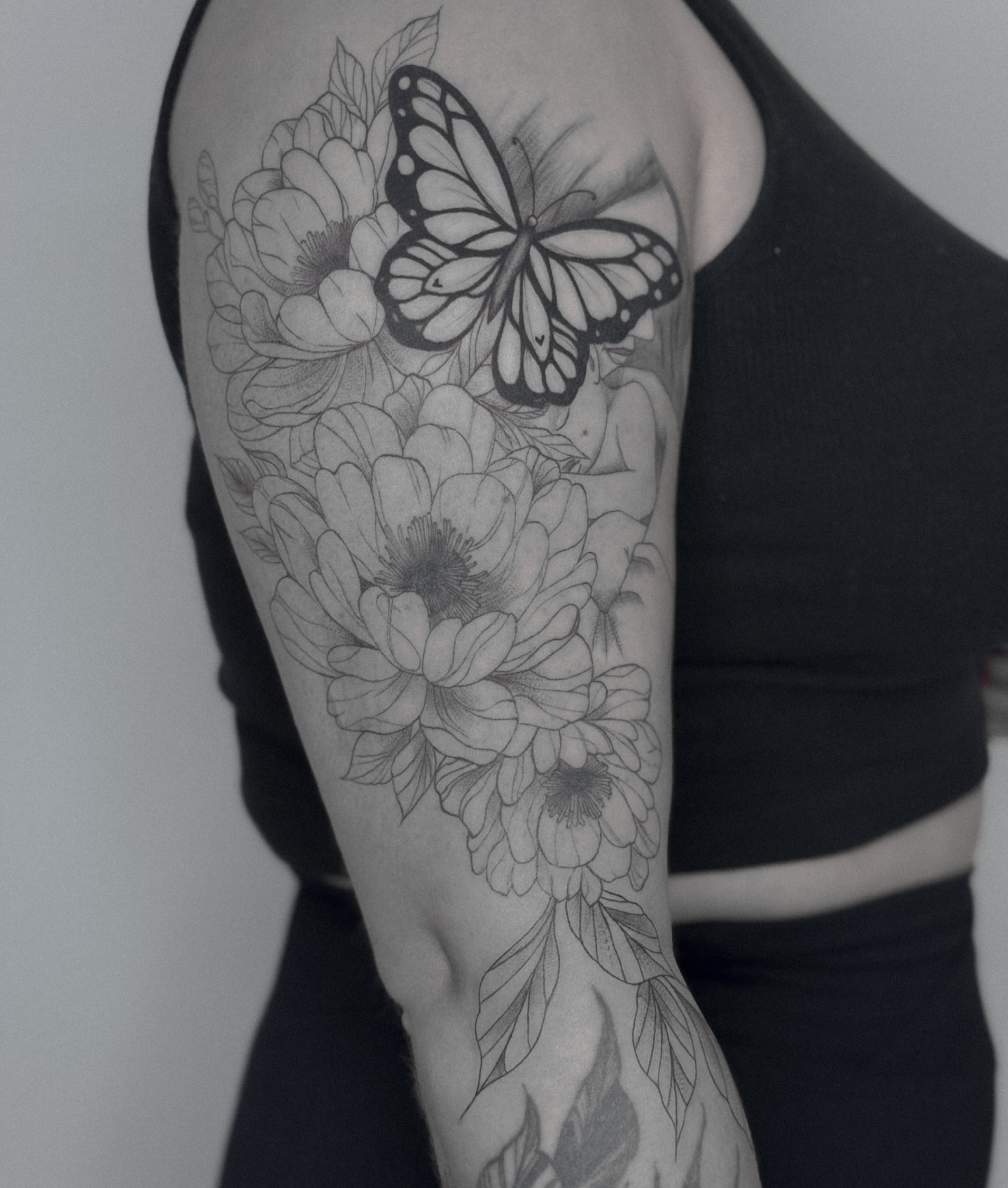 Tattoo by @romanova.skinart — black_and_grey, realism
