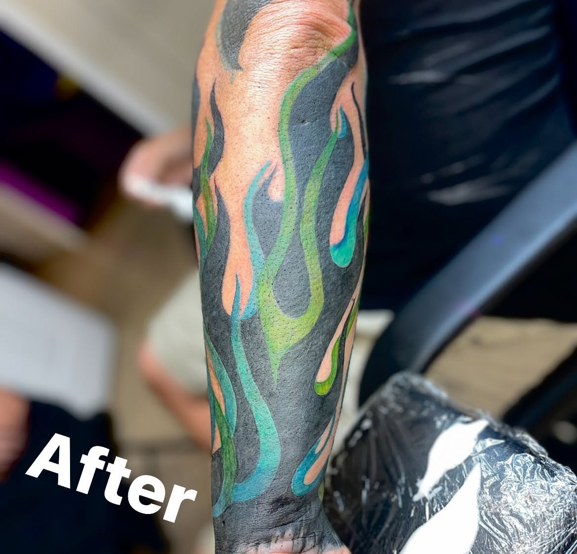 Flames new school tattoo on the forearm by Jessica DarkRabbit