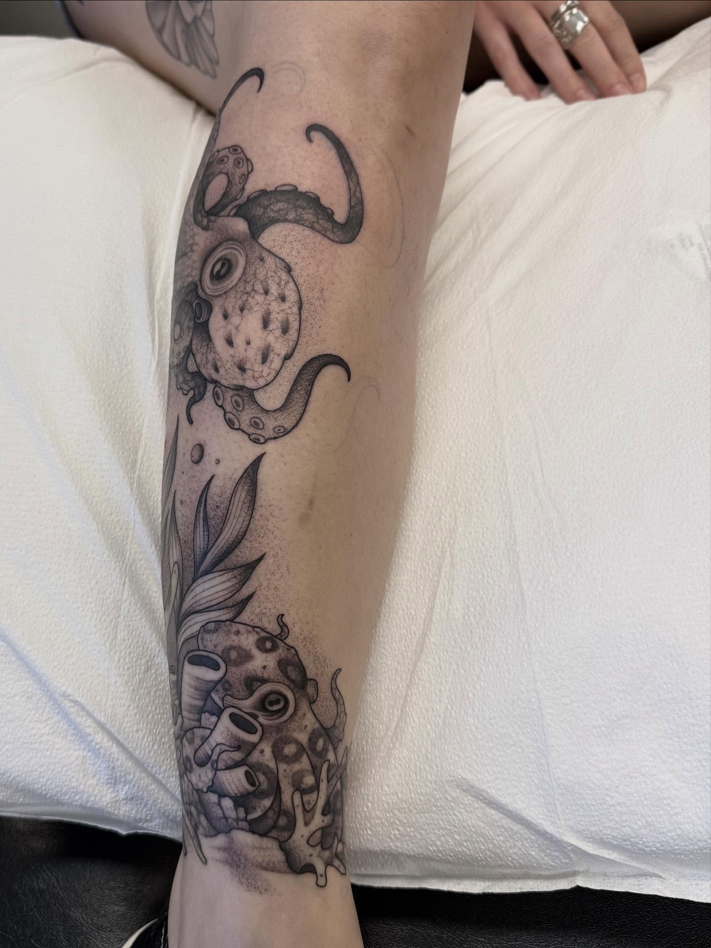Octopus and coral dotwork tattoo on the forearm by Connie Fiorino - Tattoo Artist