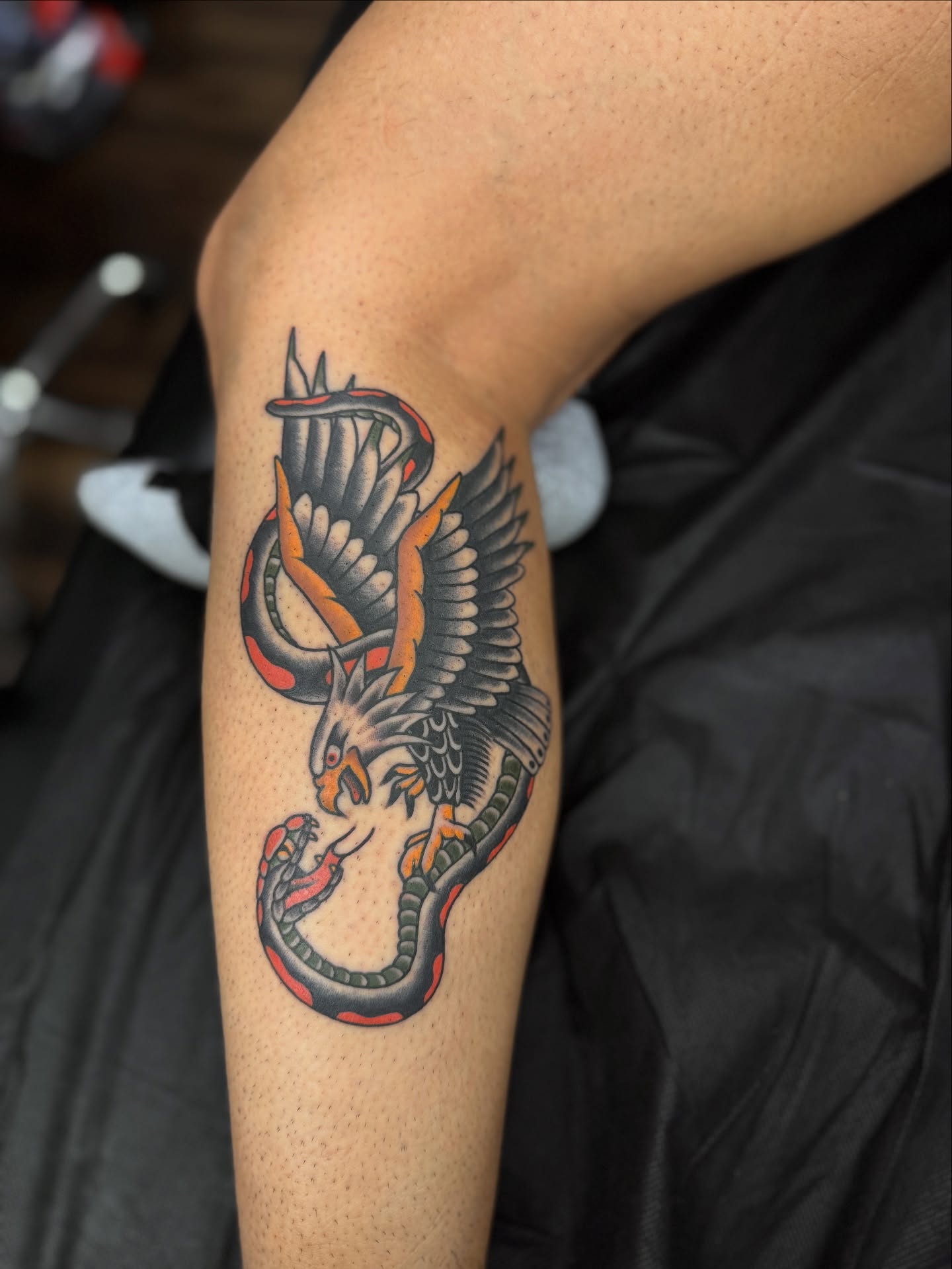 Dragon American traditional tattoo on the forearm by Sarah Pham