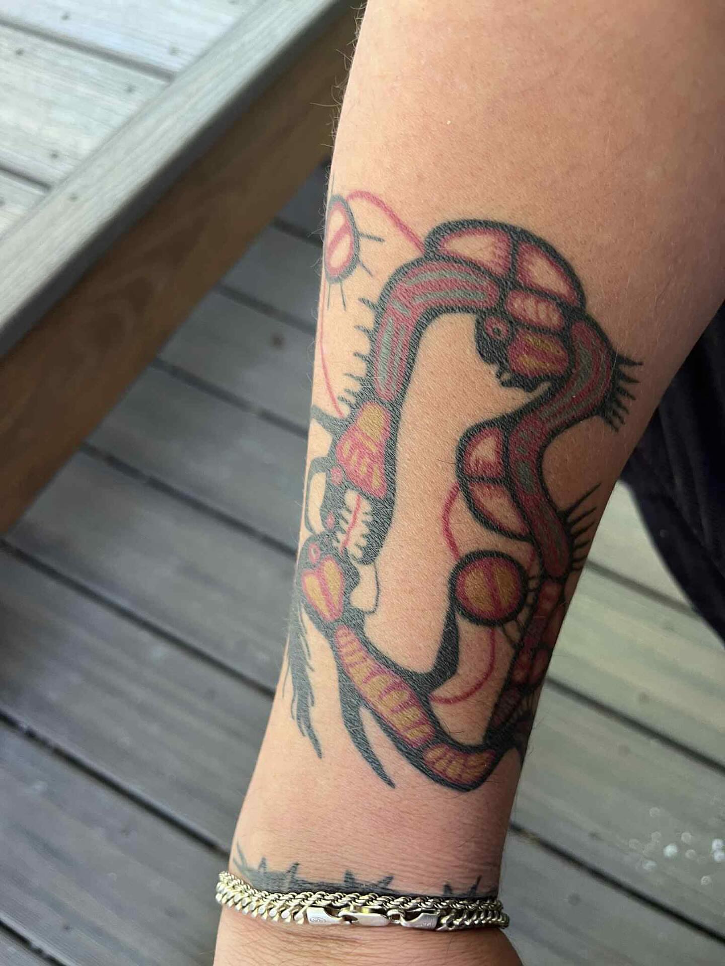 Snake American traditional tattoo on the forearm by P R O P H e T T R A V I S