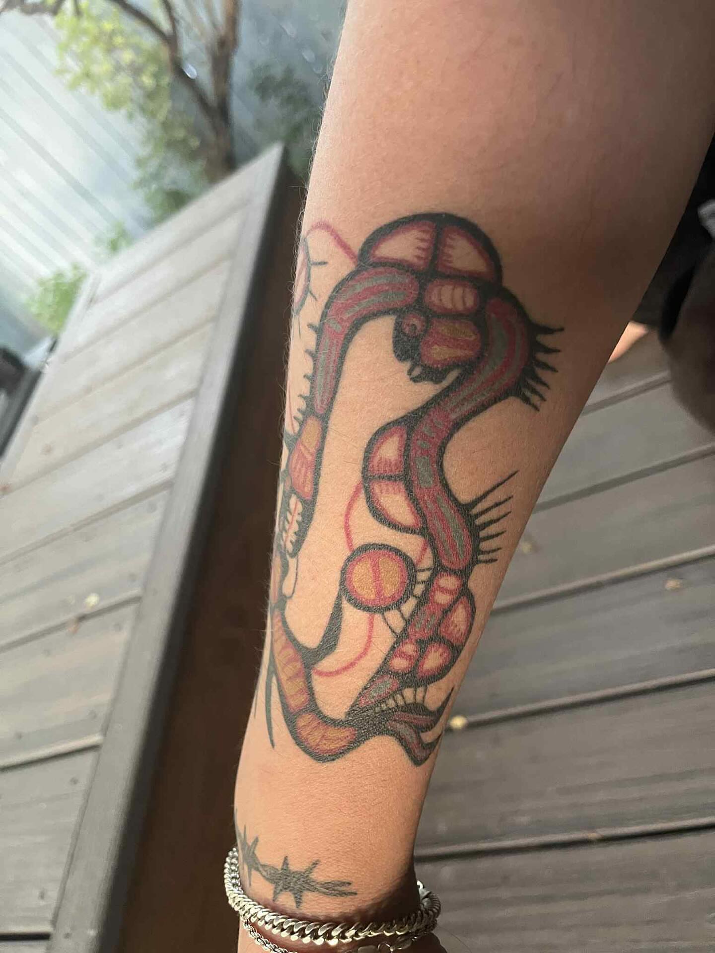 Snake American traditional tattoo on the forearm by P R O P H e T T R A V I S