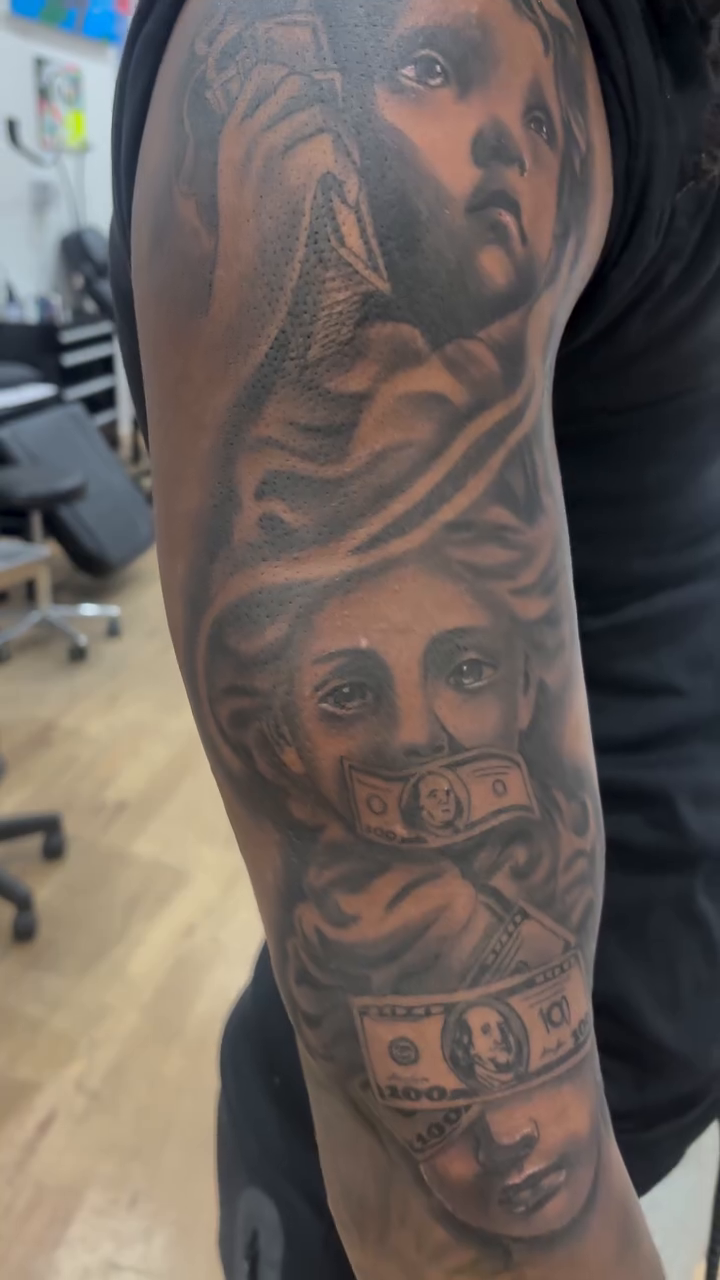 Tattoo by @teeski_ink — realism, black_and_grey