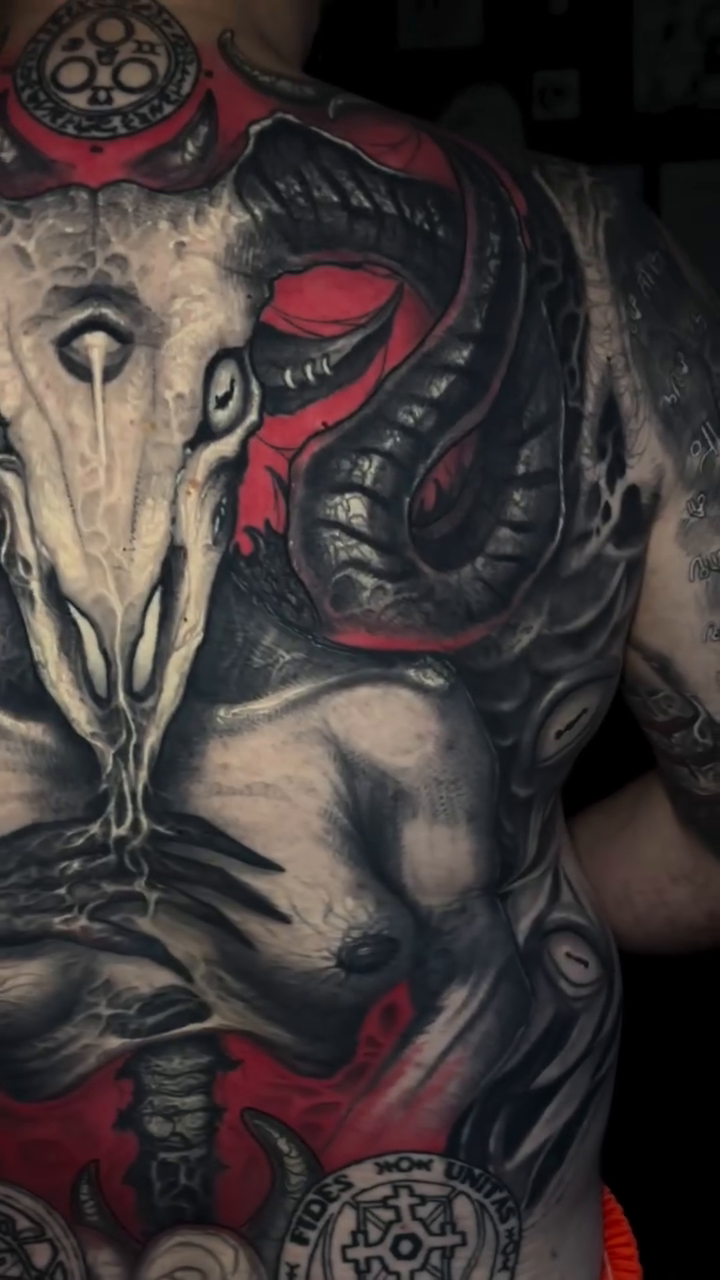 Demonic figure with ram skull dark realism tattoo by Aaron Moonan🩸Tattoo Artist NY