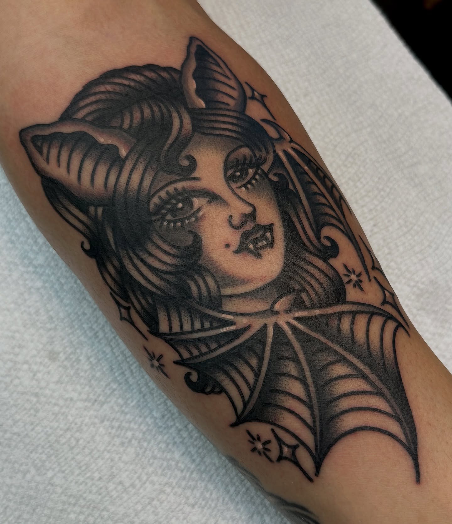 Woman with horns American traditional tattoo on the forearm by Amanda Bonhomme, Las Vegas, Nevada