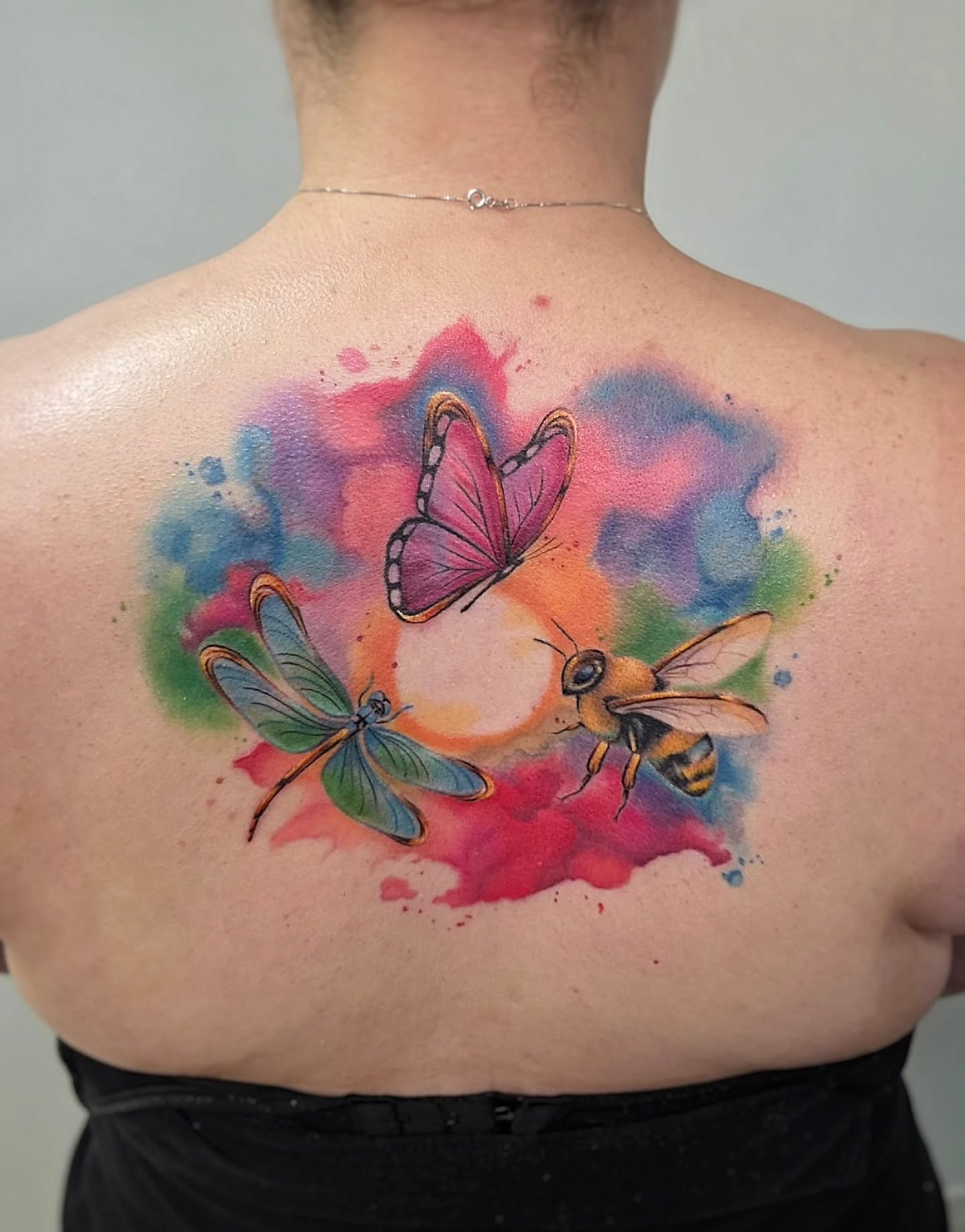Tattoo by @paige.nicole.tattoos — watercolor