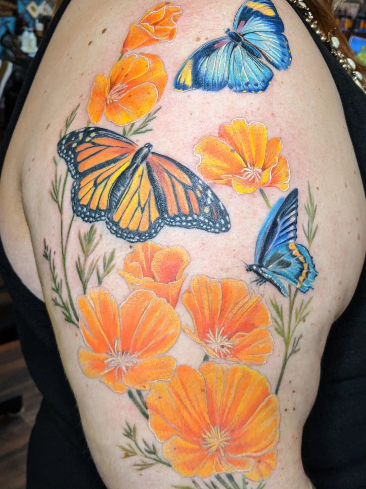 Butterflies and poppies realism tattoo on the shoulder by Ashton Allen-Ruiz, Portland, Oregon