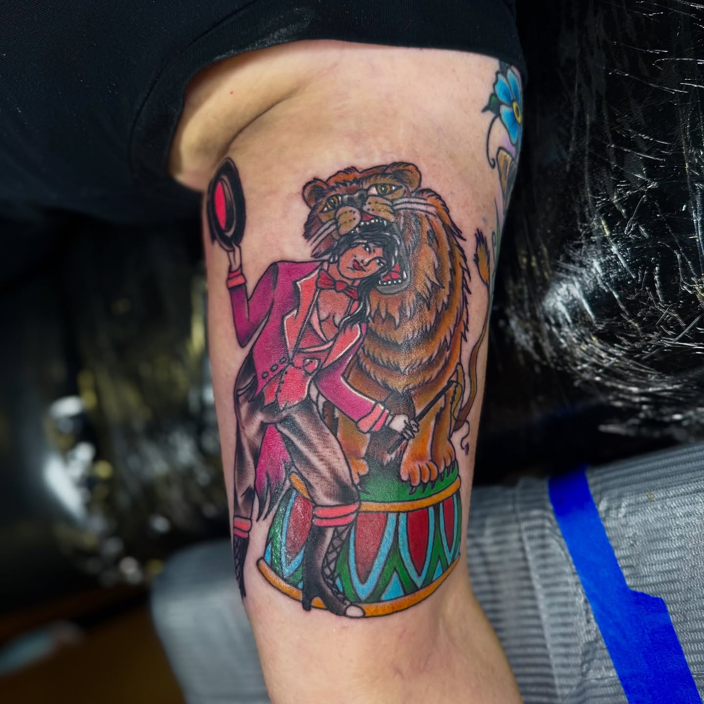 Lion tamer realism tattoo on the forearm by David C. McGhee